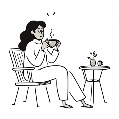 A woman sitting on a chair drinking coffee
